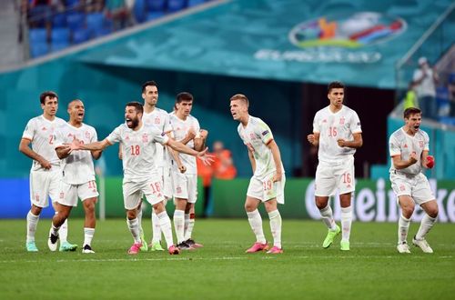 Spain celebrate coming through their penalty shoot-out with Switzerland