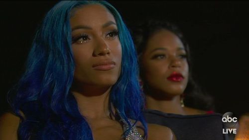 Sasha Banks and Bianca Belair listening to Maya Moore at the ESPY Awards