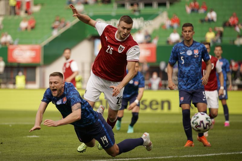 Sasa Kalajdzic (centre) in action for Austria against Slovakia