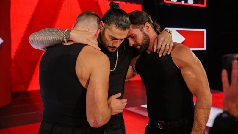 Roman Reigns with Dean Ambrose and Seth Rollins on the night he relinquished his title
