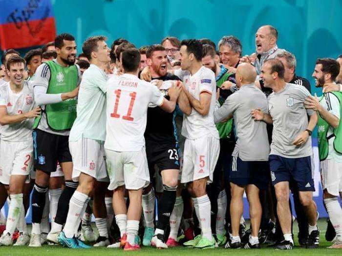 Spain players celebrate after their Euro 2020 penalty shootout win against Switzerland.