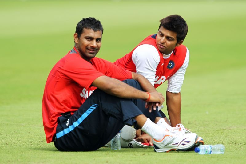 Praveen Kumar with Suresh Raina