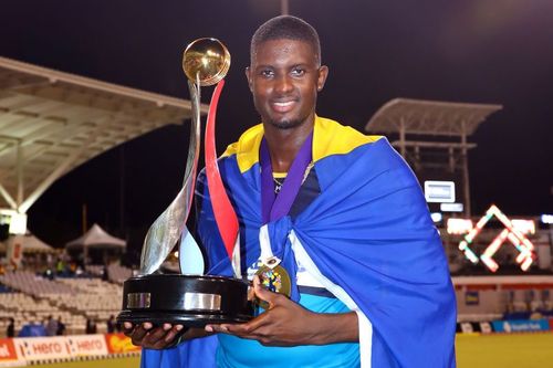 Jason Holder with the Barbados Tridents' 2019 CPL trophy.