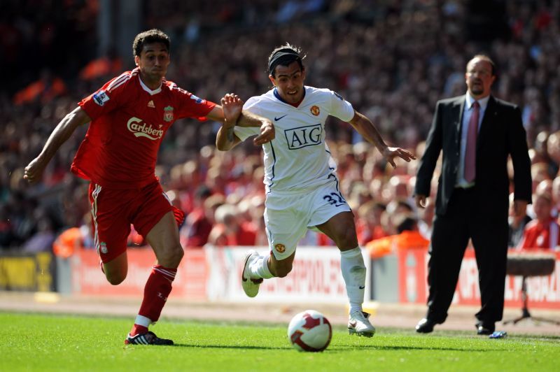 Carlos Tevez (right) in action for Manchester United