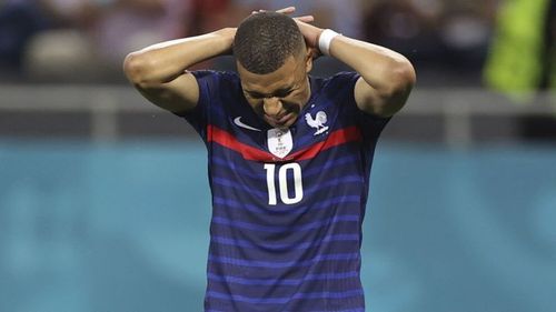 Kylian Mbappe is disappointed after his missed penalty against Switzerland at Euro 2020.