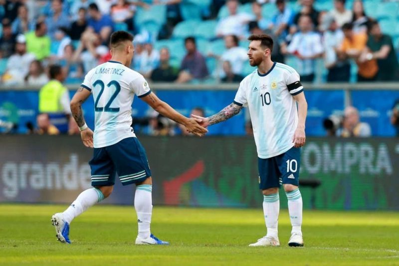 Laurato Martinez (left) and Lionel Messi