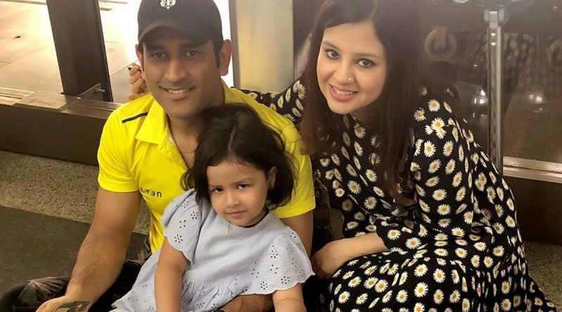 MS Dhoni with his wife and daughter