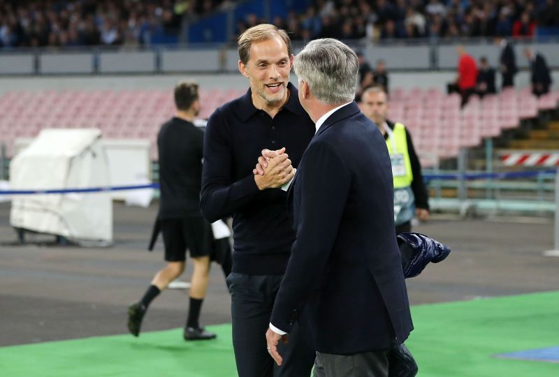 Chelsea manager Thomas Tuchel with Carlo Ancelotti. (Photo by Francesco Pecoraro/Getty Images)