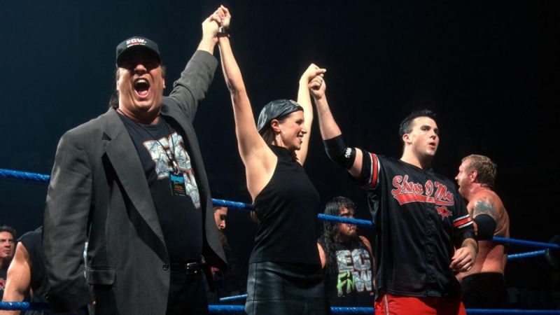 Paul Heyman with The Alliance