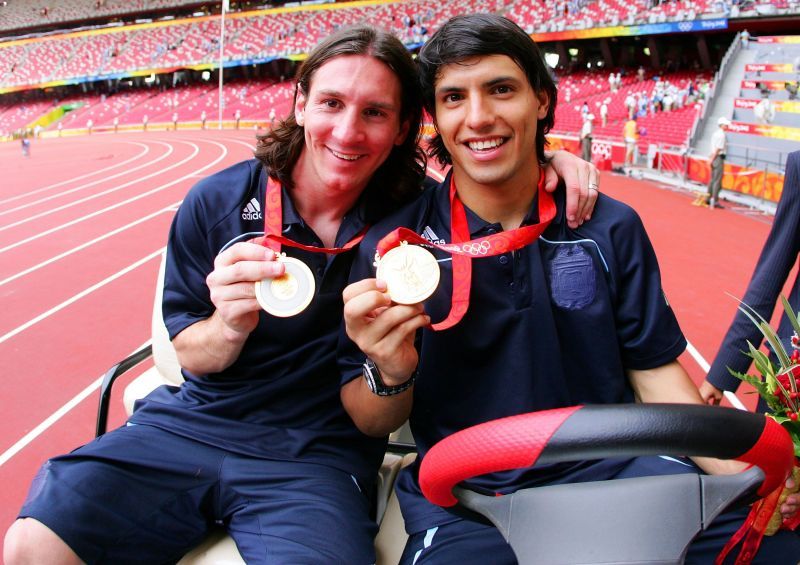 Messi and Aguero flaunting their gold medals at the 2008 Olympics
