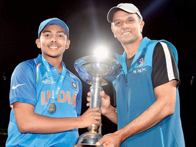 Prithvi Shaw with coach Rahul Dravid after winning the ICC Under-19 World Cup in 2018