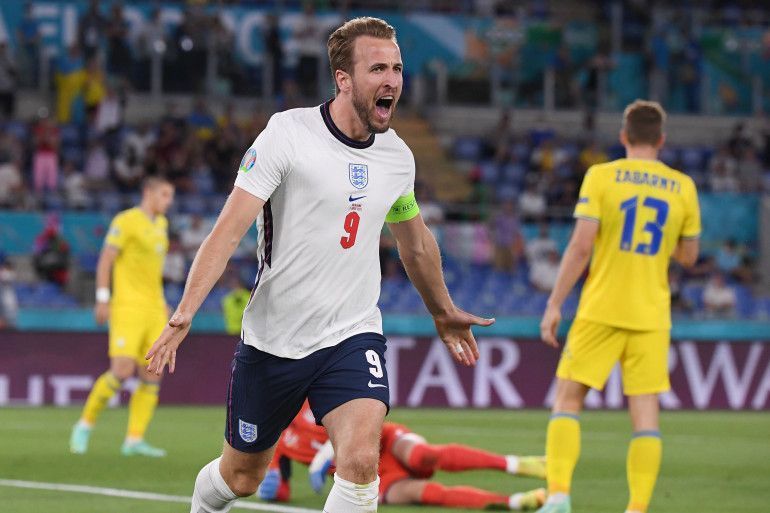 Harry Kane rejoinces after scoring one of his two goals against Ukraine.