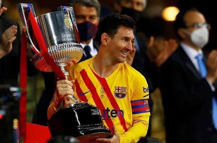 Lionel Messi with the 2021 Copa Del Rey trophy