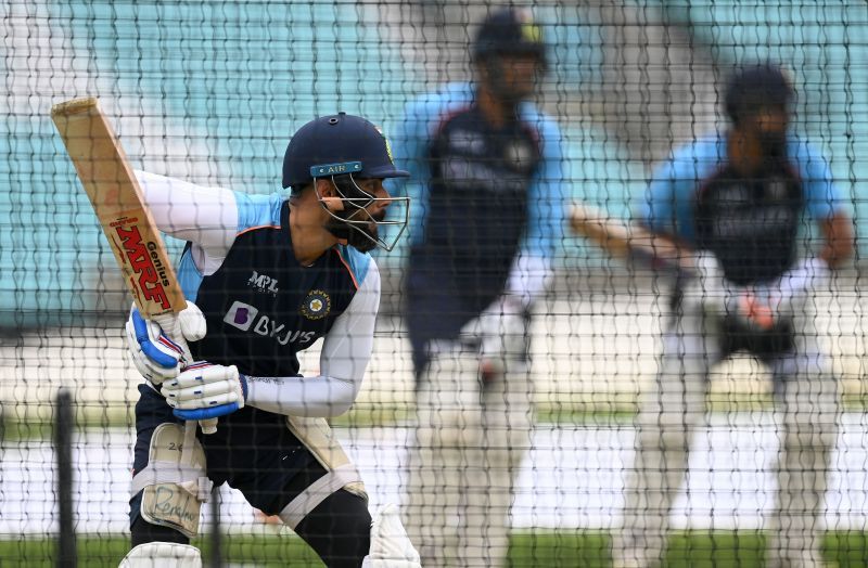 Virat Kohli bats with a determined look at The Oval.