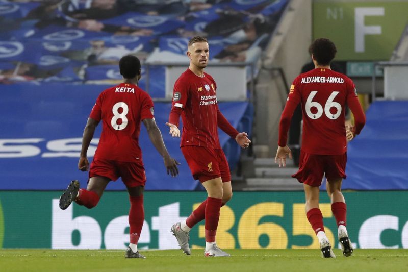 Jordan Henderson (centre) has been a regular fixture in Liverpool's midfield.