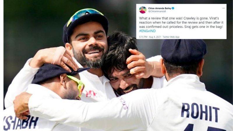 Virat Kohli embracing teammates after successful review.