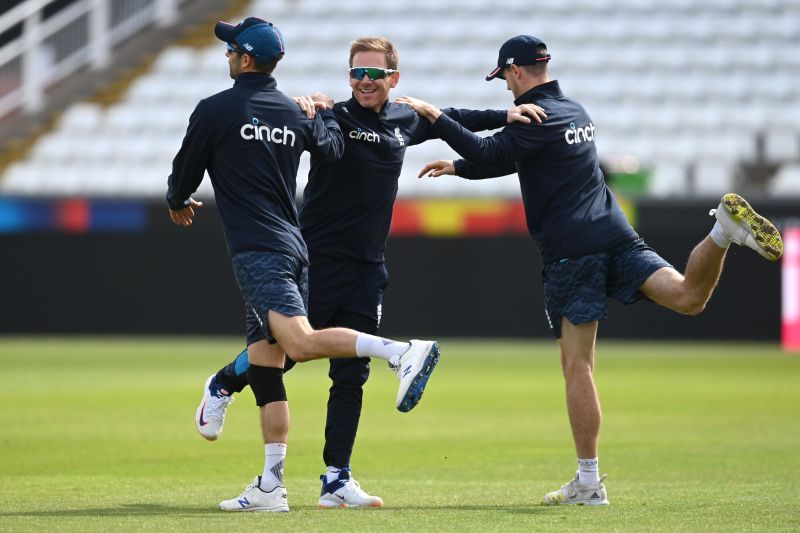 George Garton, Mark Wood and Eoin Morgan during an England training session