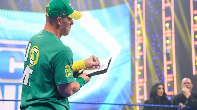 John Cena steals title match against Roman Reigns