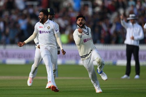 Virat Kohli (right) and Mohammed Siraj celebrate after India secured victory over England on Day 5 of the Lord's Test