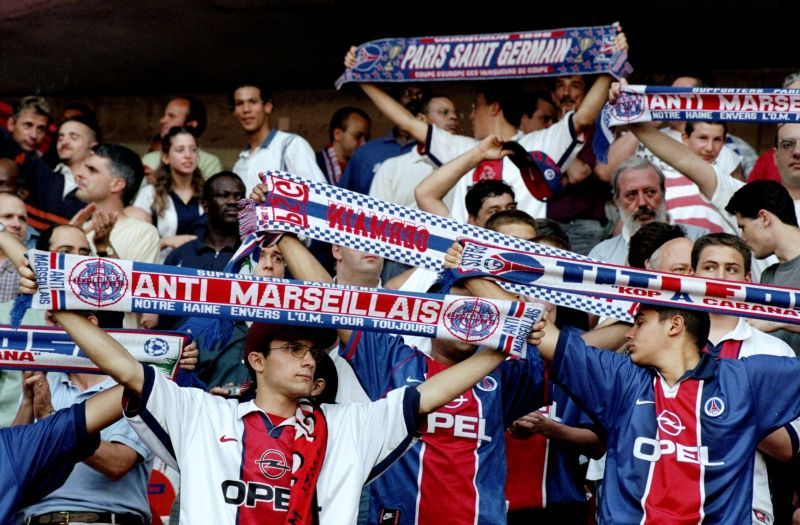 Paris St Germain fans take in the applause.