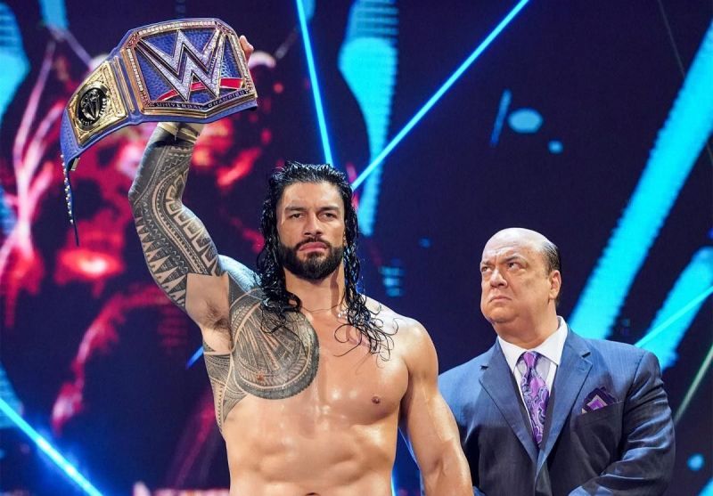 Roman Reigns alongside Paul Heyman