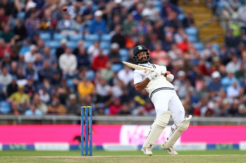 Cheteshwar Pujara scoops a delivery to the third man boundary on Day 3 of the Headingley Test. Pic: Getty Images