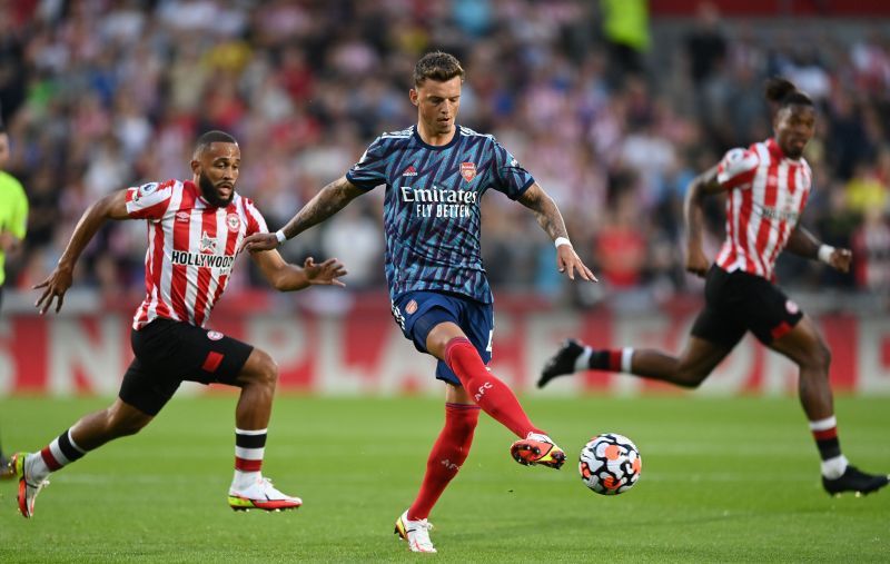 Ben White (centre) in action for Arsenal in the Premier League