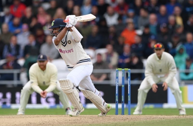 Cheteshwar Pujara was unbeaten on 91 at the end of day's play