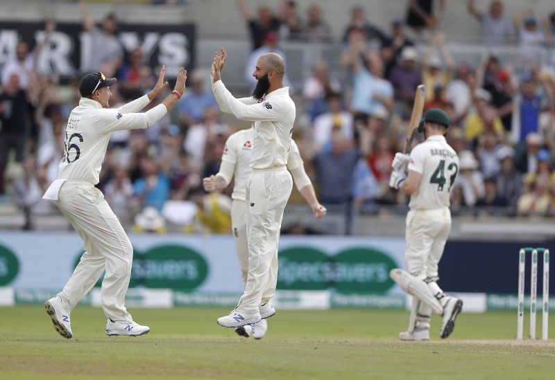 Moeen Ali celebrates a wicket during the Ashes with Joe Root.