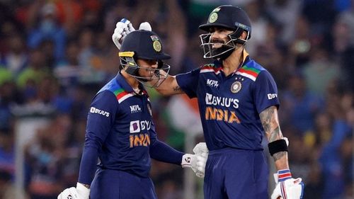 Ishan Kishan (L) and Virat Kohli on the former's T20I debut.