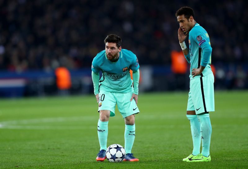 Lionel Messi and Neymar were teammates at Barcelona. (Photo by Clive Rose/Getty Images)