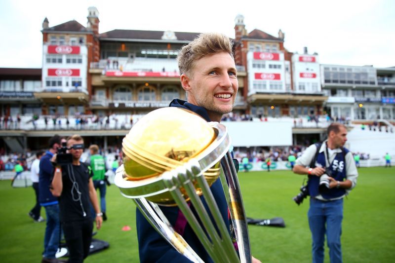 Joe Root parades with the World Cup at Lord's.