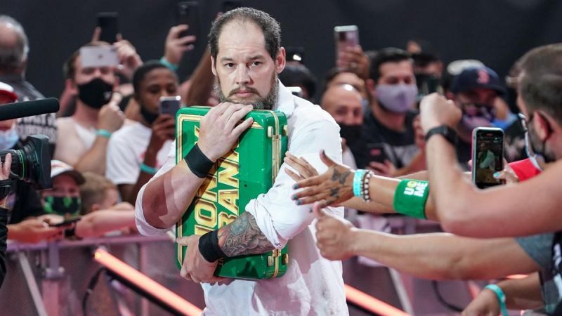 Baron Corbin carrying Big E&#039;s Money in the Bank briefcase at SummerSlam 2021