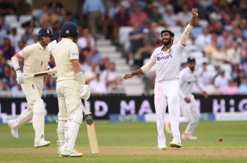 Jasprit Bumrah (right) celebrates a wicket