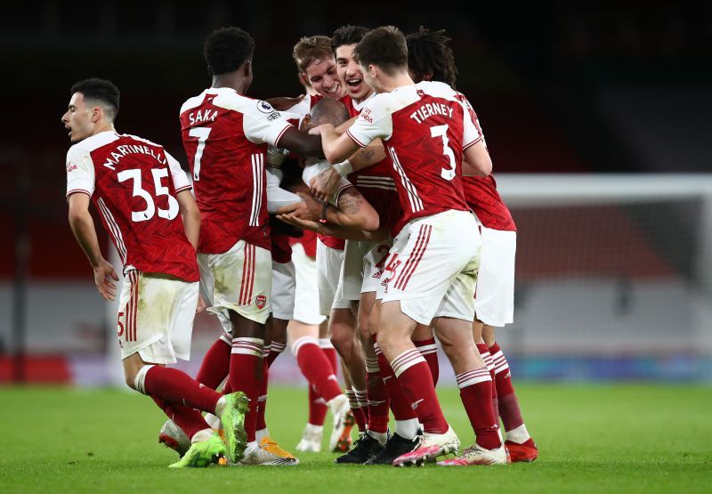 Arsenal players celebrating following a goal