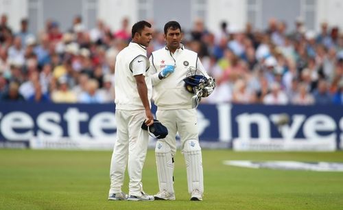 Stuart Binny alongside his captain MS Dhoni during his Test debut.