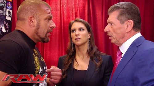 Triple H, Stephanie McMahon, and Vince McMahon