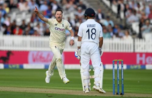 Ollie Robinson sends off Virat Kohli.