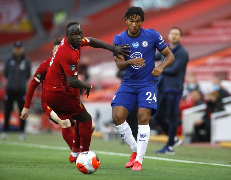 Sadio Mane (left) and Reece James tussle it out for the ball.