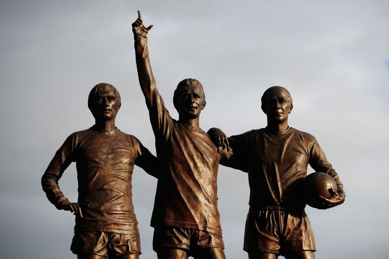 Statue of George Best (left)