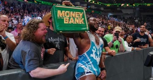 Big E with the Money in the Bank briefcase