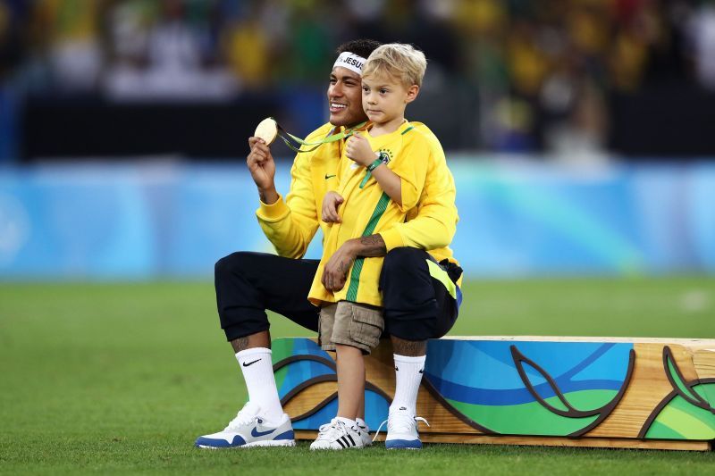 Neymar poses with his Olympic gold medal