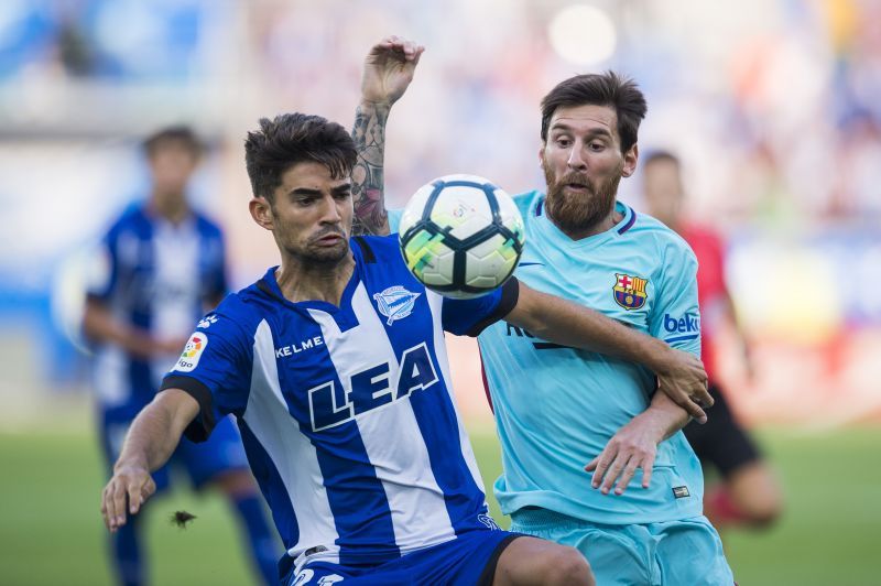 Enzo Zidane (L) battling it out with Lionel Messi