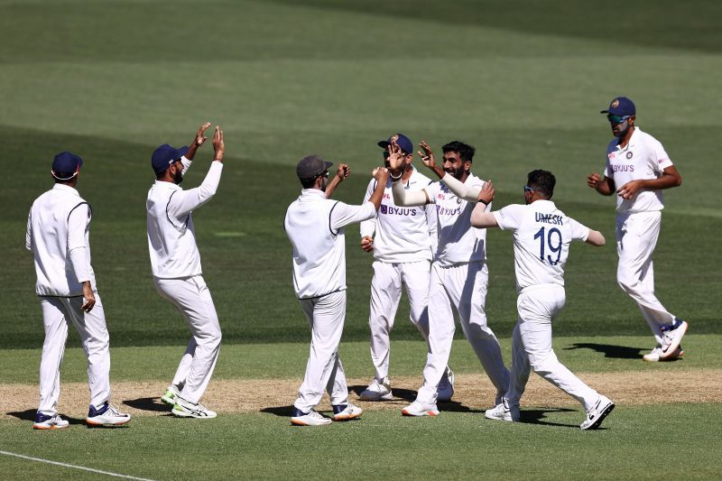 Jasprit Bumrah celebrates a wicket with teammates. Pic: Getty Images