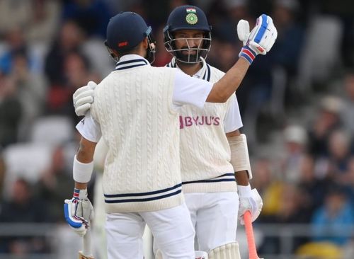 Virat Kohli (back facing camera) and Cheteshwar Pujara during their partnership on Day 3 at Headingley. Pic: BCCI/ Twitter