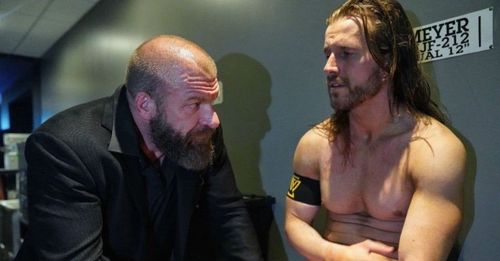 Triple H and Adam Cole.