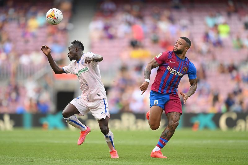 Barcelona picked up a 2-1 victory over Getafe.