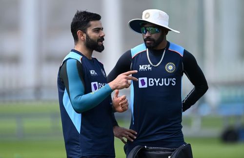 Mohammed Siraj (right) speaks to captain Virat Kohli during a net session at Lord's. Pic/ Getty Images