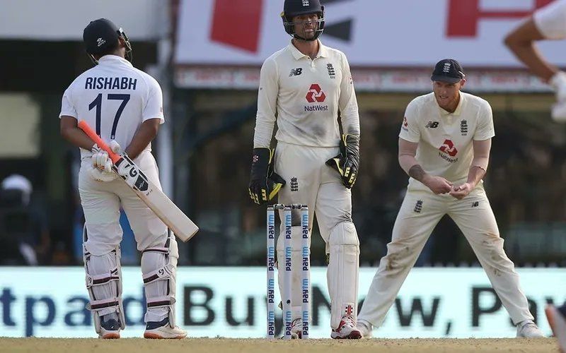 Rishabh Pant and Ben Stokes (at slip) 'chat' during the Chennai Test in March 2021. Pic: Wasim Jaffer/ Twitter