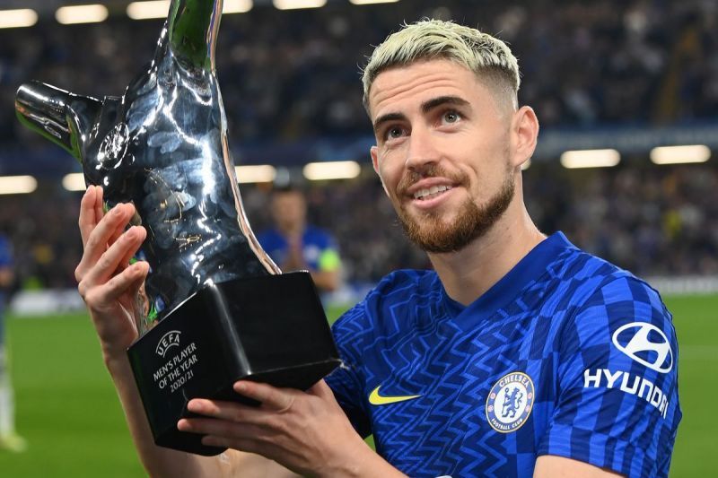 Jorginho holds his award.